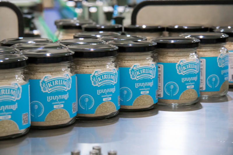 Kirum prahok powder jars on the production line